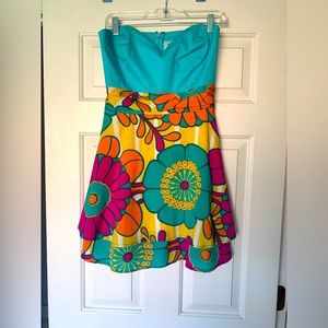 Judith March strapless minidress, with solid turquoise bodice and floral skirt